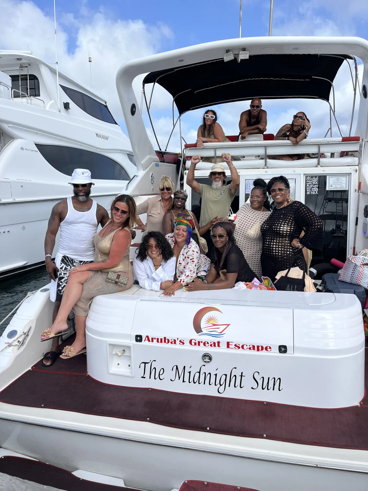 A group of people onboard of The Midnight Sun Yacht